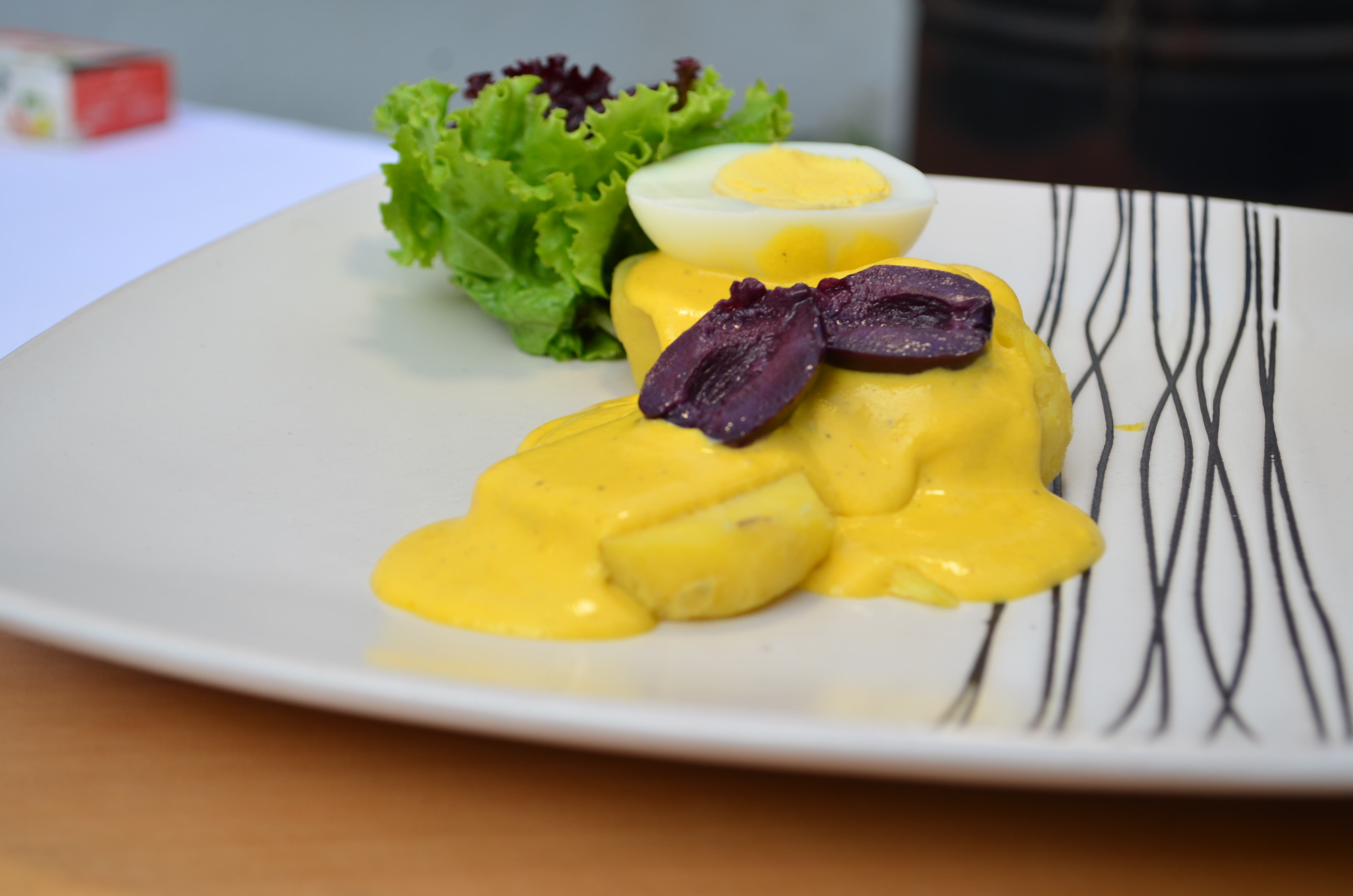 THE BEST AJI DE GALLINA IN LIMA WITH MAIDO'S FORMER CHEF  Think of tender chicken strips in a creamy yellow chilli parmesan sauce served with Peruvian garnish.  best aji de gallina en lima peru with former maido's head at chef Peruvian Cooking Classes. 10 best things to do in miraflores lima Peru